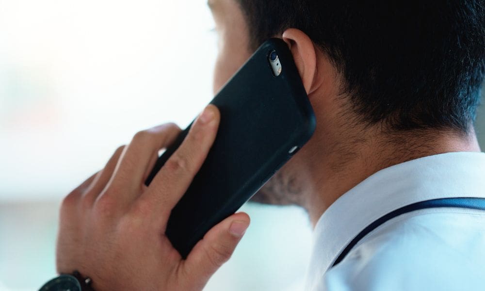 Man holding phone to ear