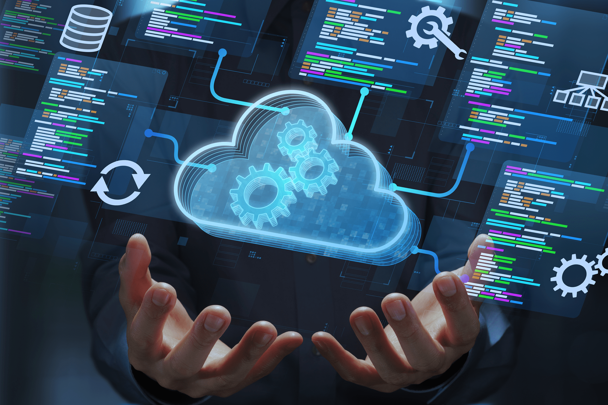 Hands holding a glowing cloud with gears, symbolizing cloud computing technology.