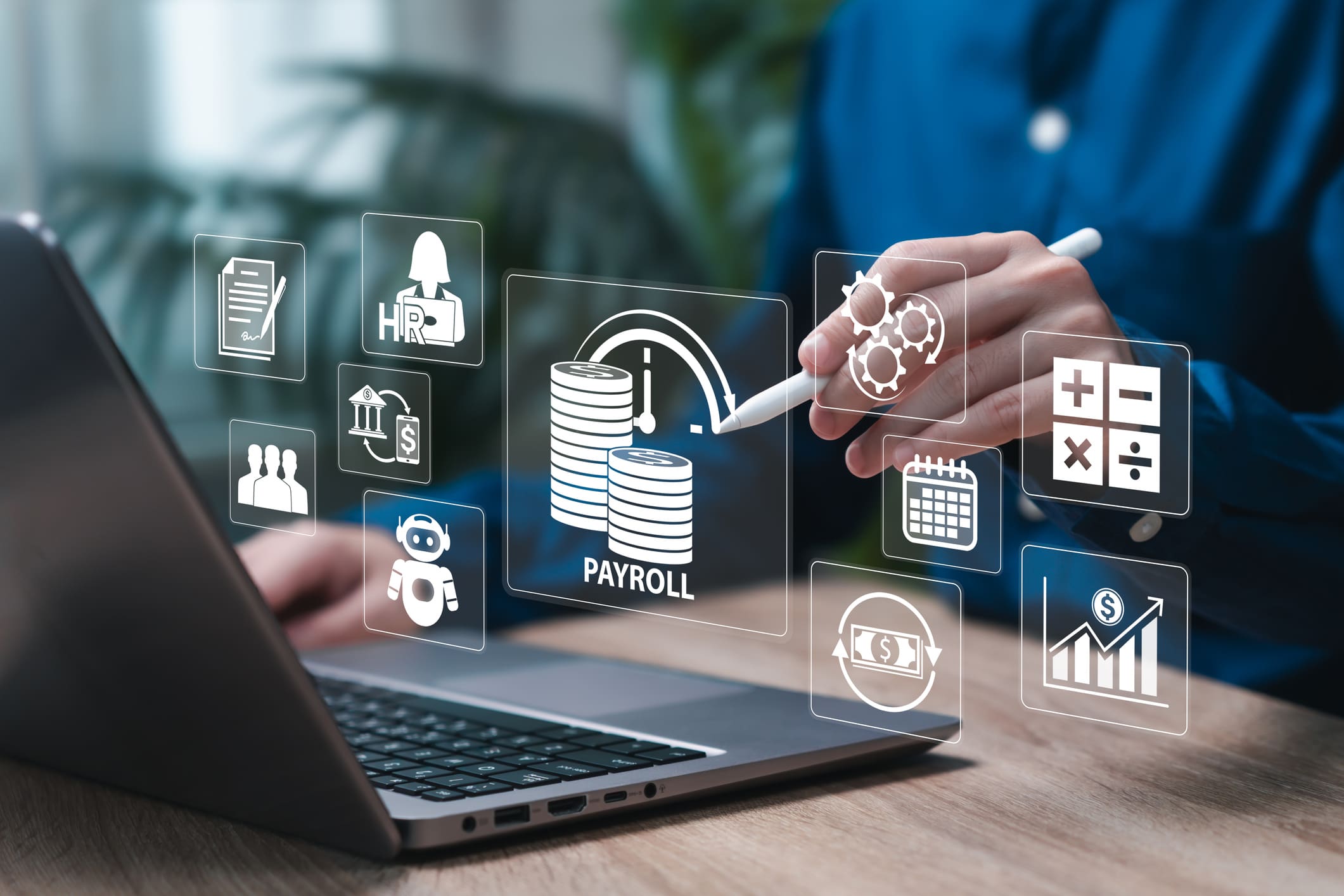 Digital security icons overlaying a laptop and a person working.